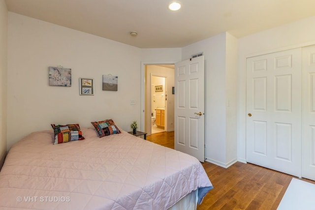 976 Enfield Dr, Northbrook, IL 60062 - bedroom with wood finished floors and recessed lighting