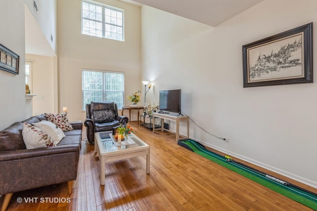 976 Enfield Dr, Northbrook, IL 60062 - living room with wood finished floors, plenty of natural light, and a towering ceiling