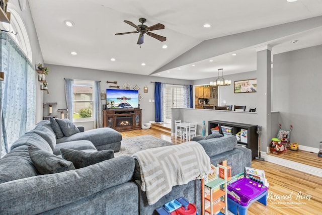 601 E Washington St, Ashkum, IL 60911 - living area featuring light wood-style flooring, lofted ceiling, plenty of natural light, a ceiling fan, and recessed lighting