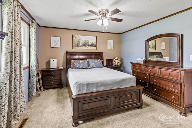 601 E Washington St, Ashkum, IL 60911 - bedroom featuring light colored carpet, ornamental molding, and a ceiling fan