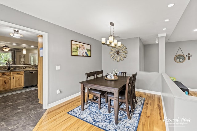 601 E Washington St, Ashkum, IL 60911 - dining space with wood finished floors, recessed lighting, and a chandelier