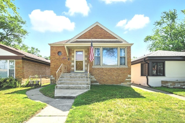 10105 S California Ave, Chicago, IL 60655 - bungalow featuring brick siding and a front yard