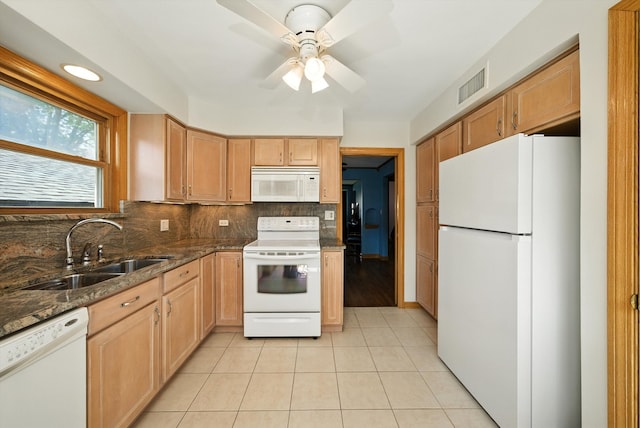 10105 S California Ave, Chicago, IL 60655 - kitchen with white appliances, backsplash, ceiling fan, dark stone countertops, and light tile patterned flooring