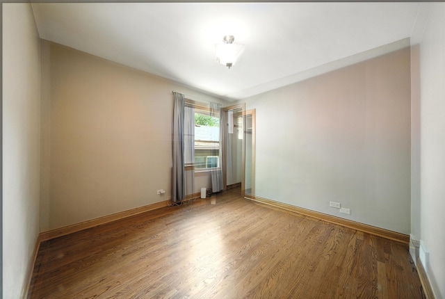 10105 S California Ave, Chicago, IL 60655 - unfurnished room featuring wood finished floors and baseboards