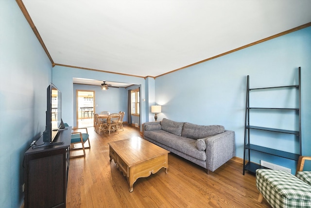 10105 S California Ave, Chicago, IL 60655 - living area featuring crown molding, a ceiling fan, and wood finished floors