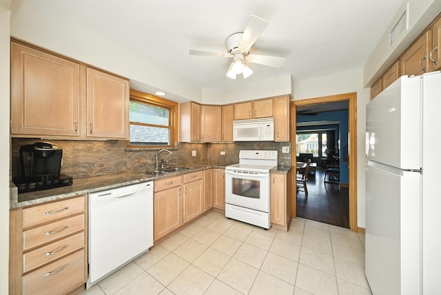 10105 S California Ave, Chicago, IL 60655 - kitchen with white appliances, backsplash, a ceiling fan, dark stone counters, and light tile patterned floors
