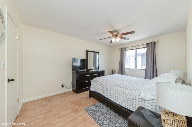 6265 Gold Cir Unit 6265, Hanover Park, IL 60133 - bedroom with light wood-style flooring and ceiling fan