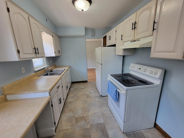 2928 Ridgeway Ave, Rockford, IL 61101 - kitchen featuring white appliances, under cabinet range hood, light countertops, and stone finish floors