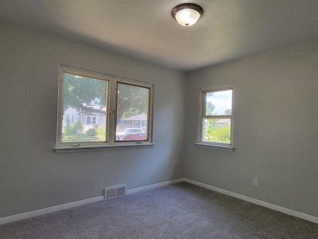 2928 Ridgeway Ave, Rockford, IL 61101 - carpeted spare room featuring baseboards