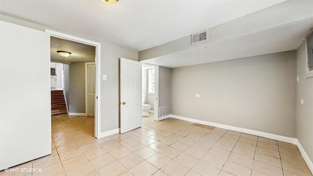 309 W 109th Pl, Chicago, IL 60628 - unfurnished bedroom with light tile patterned floors and ensuite bathroom