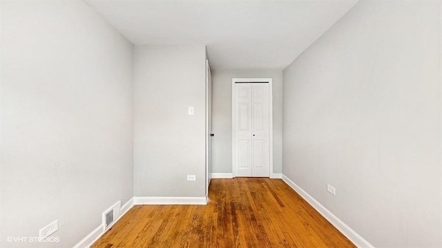 309 W 109th Pl, Chicago, IL 60628 - empty room with wood finished floors and baseboards