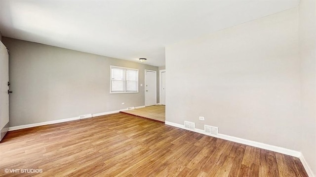 309 W 109th Pl, Chicago, IL 60628 - empty room with light wood-type flooring