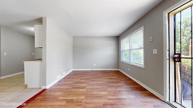 309 W 109th Pl, Chicago, IL 60628 - entryway with light wood-style floors and baseboards