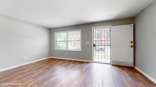 309 W 109th Pl, Chicago, IL 60628 - entryway featuring wood finished floors and baseboards