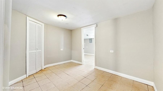 309 W 109th Pl, Chicago, IL 60628 - unfurnished room featuring light tile patterned floors and baseboards