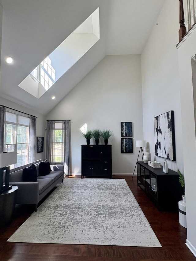 17 Harborside Way, Hawthorn Woods, IL 60047 - living area with high vaulted ceiling, dark wood-style floors, a skylight, and recessed lighting