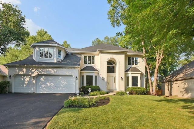 1123 Thackery Ln, Naperville, IL 60564 - view of front facade with driveway, a front lawn, and an attached garage
