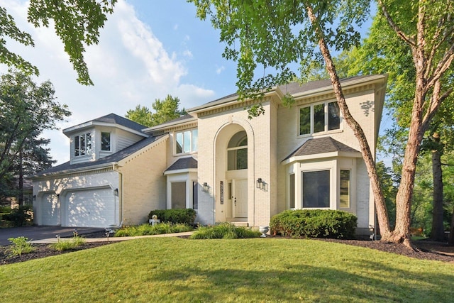 1123 Thackery Ln, Naperville, IL 60564 - view of front of home featuring brick siding, asphalt driveway, and a front yard