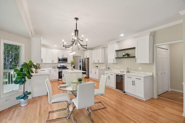 1123 Thackery Ln, Naperville, IL 60564 - dining room with wine cooler, a chandelier, light wood-type flooring, crown molding, and recessed lighting