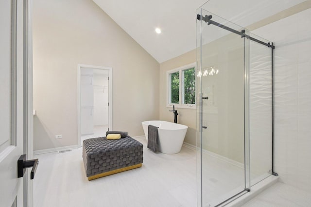 1123 Thackery Ln, Naperville, IL 60564 - bathroom featuring a stall shower, a soaking tub, lofted ceiling, and recessed lighting