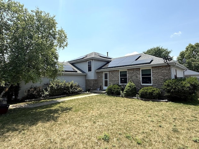 1907 Larkspur Dr, Plainfield, IL 60586 - split level home with a front lawn, solar panels, and brick siding