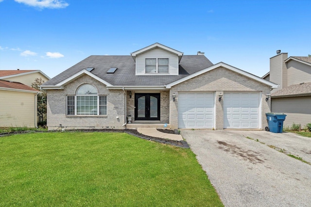 3032 Sandy Ridge Dr, Steger, IL 60475 - view of front of house featuring asphalt driveway, a garage, brick siding, a front lawn, and french doors