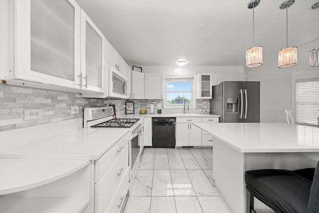 3032 Sandy Ridge Dr, Steger, IL 60475 - kitchen with white appliances, light marble finish flooring, light countertops, and a chandelier