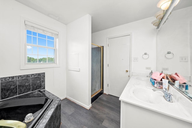 3032 Sandy Ridge Dr, Steger, IL 60475 - full bathroom with wood finished floors, a bath, double vanity, and a shower stall