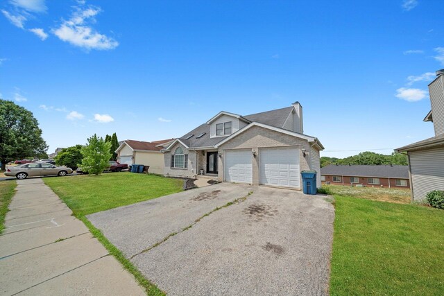 3032 Sandy Ridge Dr, Steger, IL 60475 - view of front facade with driveway, a garage, a front yard, brick siding, and a shingled roof