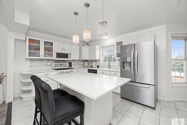 3032 Sandy Ridge Dr, Steger, IL 60475 - kitchen with white appliances, backsplash, light marble finish floors, glass insert cabinets, and light countertops