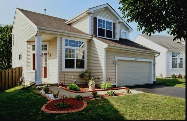 20517 Superior Ct, Crest Hill, IL 60403 - traditional-style house featuring asphalt driveway and an attached garage