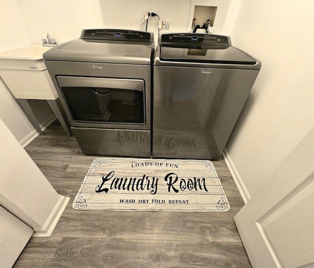 20517 Superior Ct, Crest Hill, IL 60403 - washroom with washing machine and clothes dryer and wood finished floors