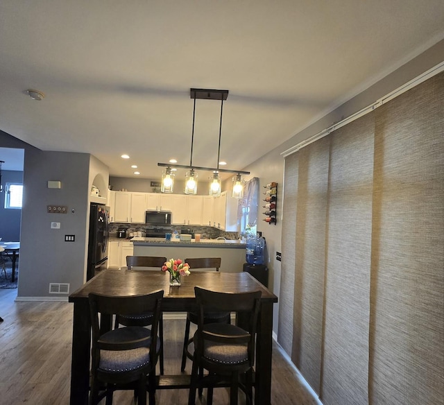 20517 Superior Ct, Crest Hill, IL 60403 - dining room with dark wood-style flooring and recessed lighting