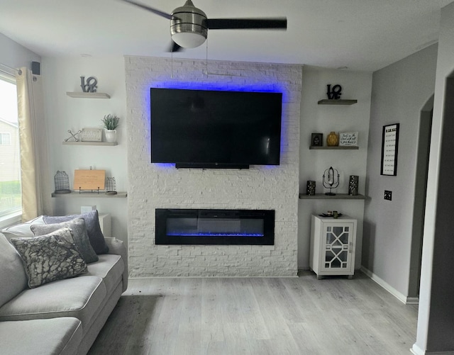 20517 Superior Ct, Crest Hill, IL 60403 - living room featuring a ceiling fan, wood finished floors, and a fireplace