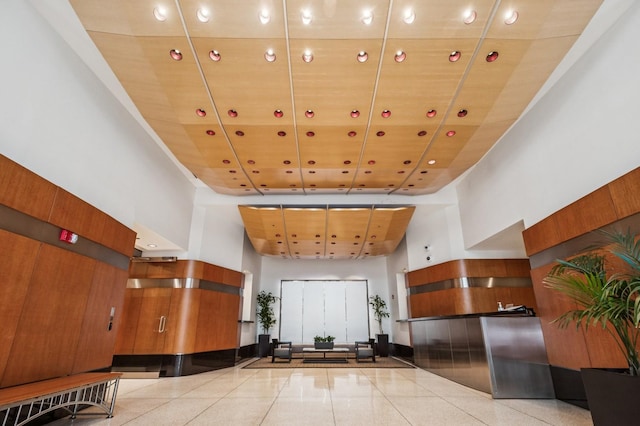 512 N Mcclurg Ct Unit 4302, Chicago, IL 60611 - lobby featuring a high ceiling, wooden ceiling, and recessed lighting