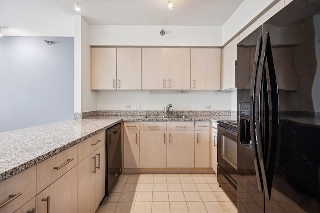512 N Mcclurg Ct Unit 4302, Chicago, IL 60611 - kitchen featuring black appliances, light brown cabinets, light stone counters, and light tile patterned floors