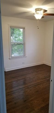 3608 Jackson St Unit 2E, Bellwood, IL 60104 - spare room with a ceiling fan and dark wood-type flooring
