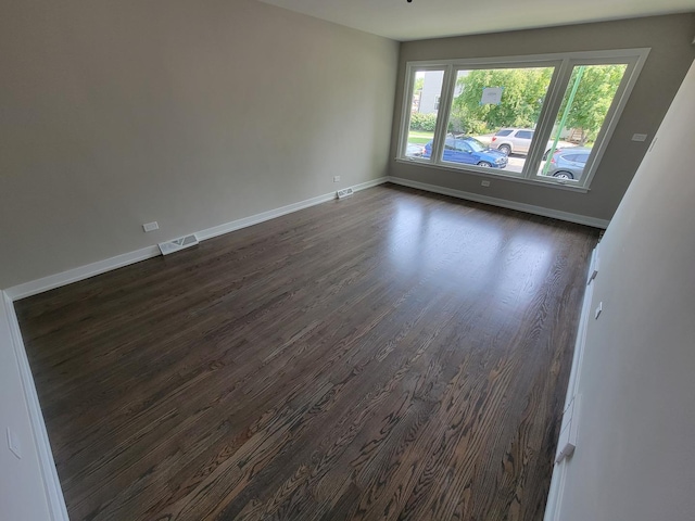 6308 W Cornelia Ave, Chicago, IL 60634 - unfurnished room with dark wood finished floors