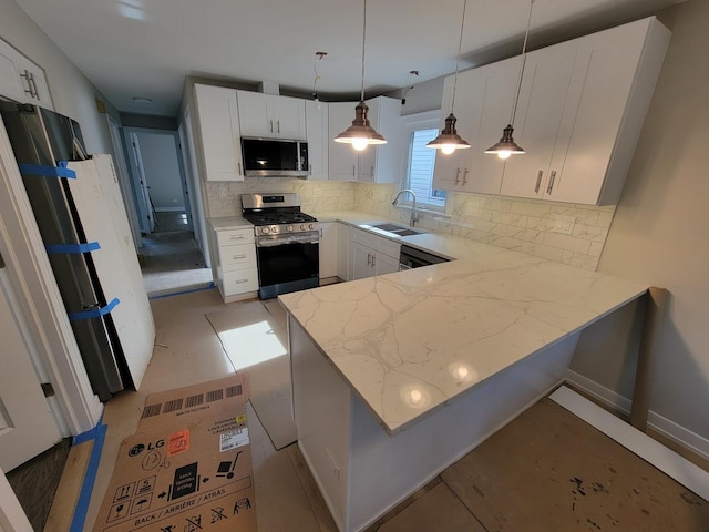6308 W Cornelia Ave, Chicago, IL 60634 - kitchen featuring appliances with stainless steel finishes, backsplash, light stone counters, and white cabinetry