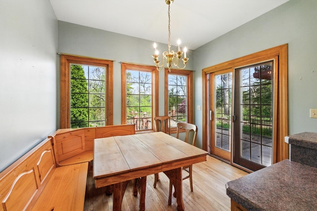 3664 E 2619th Rd, Sheridan, IL 60551 - dining room featuring a chandelier and light wood-style flooring