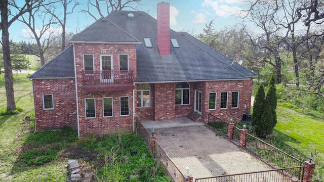 3664 E 2619th Rd, Sheridan, IL 60551 - rear view of house featuring brick siding, a chimney, and a shingled roof