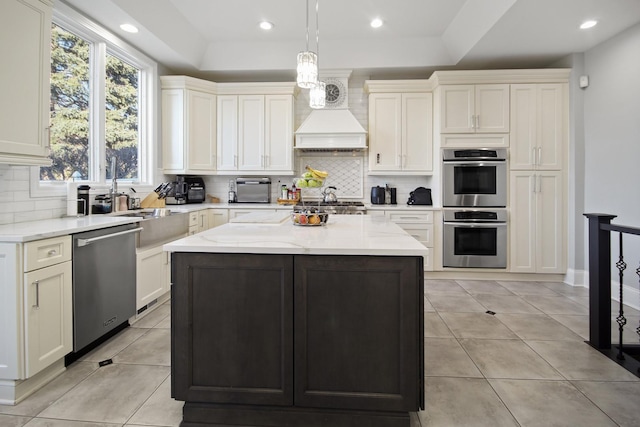 8040 W Balmoral Ave, Norwood Park Township, IL 60631 - kitchen featuring appliances with stainless steel finishes, decorative backsplash, light tile patterned flooring, light stone countertops, and recessed lighting