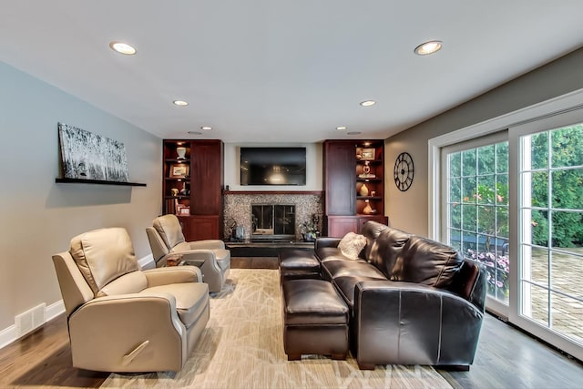 1194 Oxford Ct, Highland Park, IL 60035 - living area with recessed lighting, wood finished floors, and a glass covered fireplace