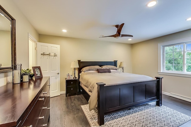 1194 Oxford Ct, Highland Park, IL 60035 - bedroom featuring dark wood-style floors, recessed lighting, a ceiling fan, and a baseboard heating unit