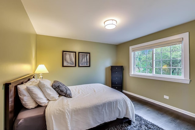 1194 Oxford Ct, Highland Park, IL 60035 - bedroom with dark wood finished floors and baseboards