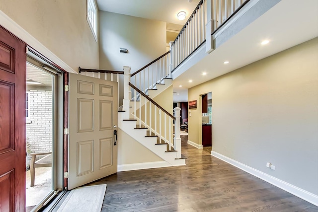1194 Oxford Ct, Highland Park, IL 60035 - entryway with wood finished floors, a high ceiling, stairs, and recessed lighting