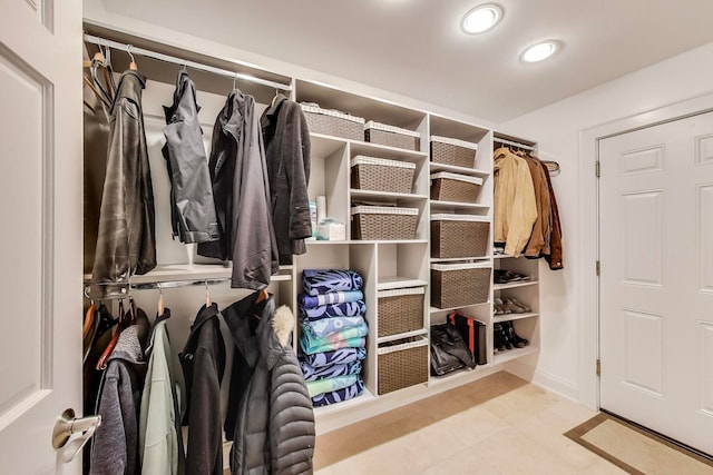 1194 Oxford Ct, Highland Park, IL 60035 - walk in closet featuring tile patterned floors
