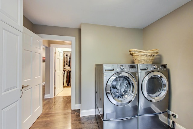 1194 Oxford Ct, Highland Park, IL 60035 - laundry room with washer and dryer and dark wood-style floors