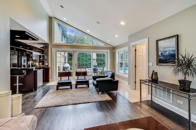 1194 Oxford Ct, Highland Park, IL 60035 - living room with dark wood-type flooring, recessed lighting, and high vaulted ceiling