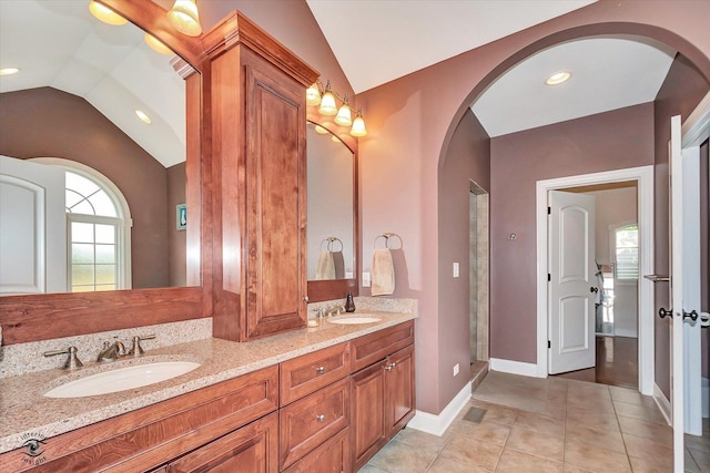 24155 S Blackhawk Ln, Manhattan, IL 60442 - bathroom with vaulted ceiling, double vanity, tile patterned flooring, recessed lighting, and a shower stall